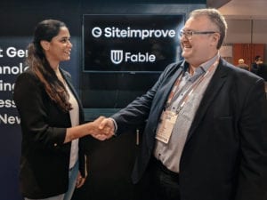 Alwar Pillai of Fable and Peter Bovin of Siteimprove shake hands