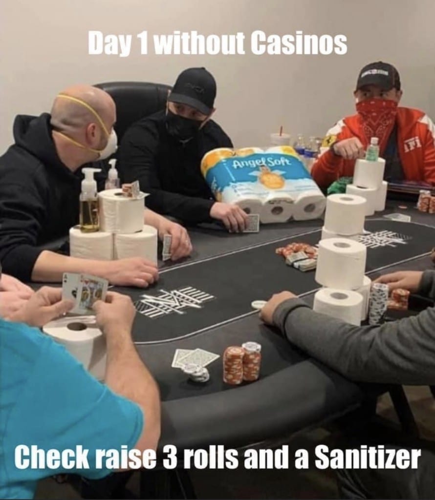 COVID Meme Men wearing masks sit around a table playing poker, betting packs of toilet paper and hand sanitizer. Caption: Day 1 without casinos - Check raise 3 rolls and a sanitizer