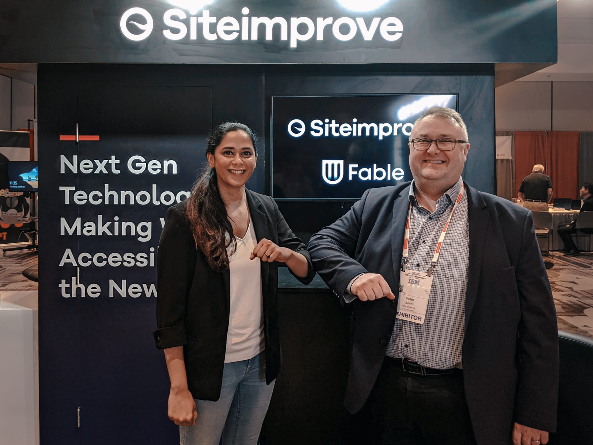 Alwar and Peter bump elbows at CSUN 2020, launching Fable's partnership with Siteimprove