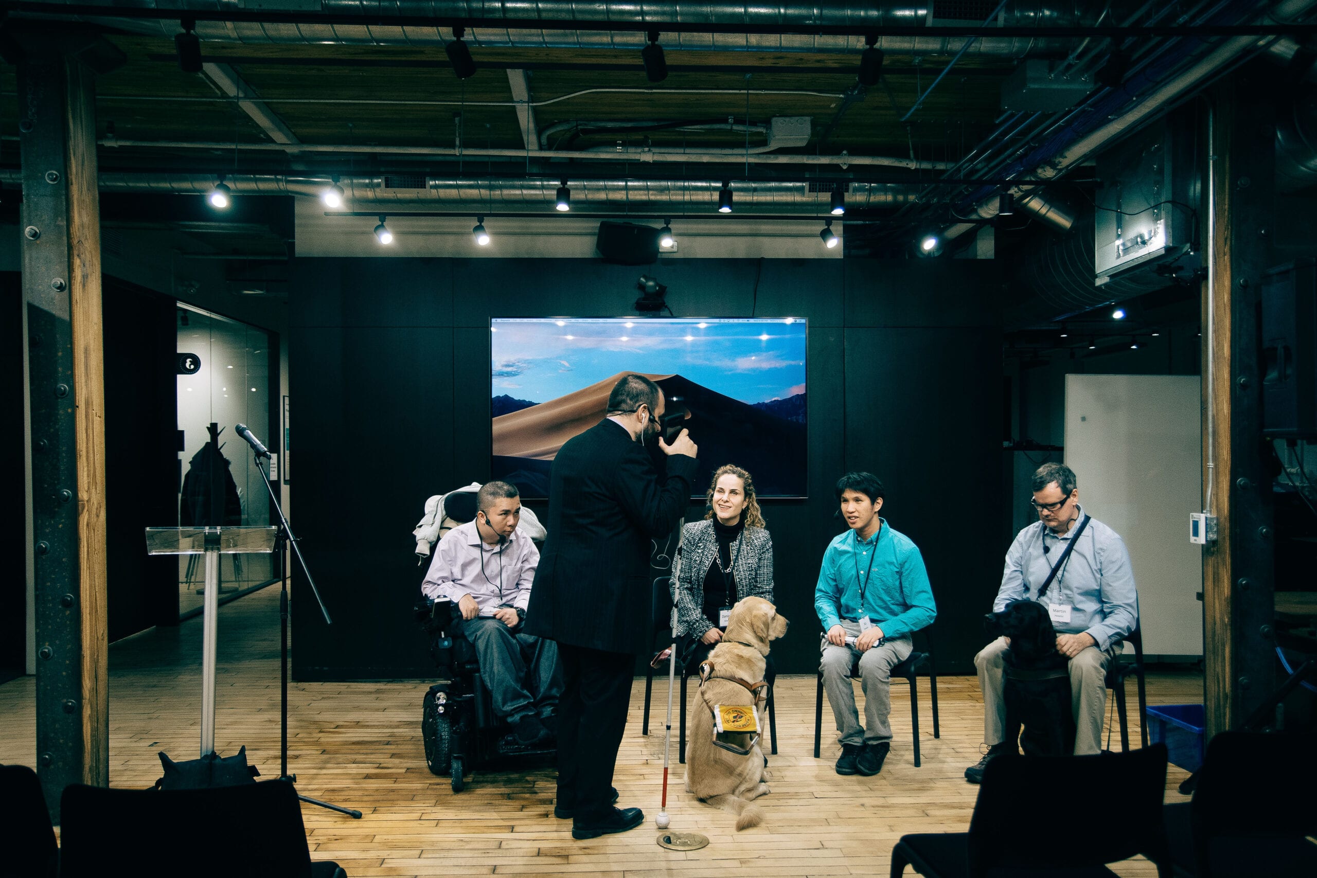 Sam, Vu, Daniella, Ka and Martin prepare on stage at Wealthsimple for an event in Feb of 2019