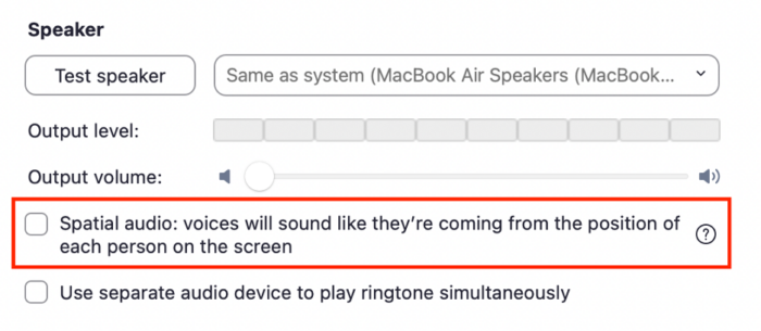 Screenshot of Zoom speaker settings interface. Options include "Test speaker (dropdown menu), Output level (sound meter) and output volume (slider). Below, a checkbox labeled "Spatial audio: voices will sound like they’re coming from the position of each person on the screen" is outlined in red, and another checkbox for "Use separate audio device to play ringtone simultaneously" is unchecked.