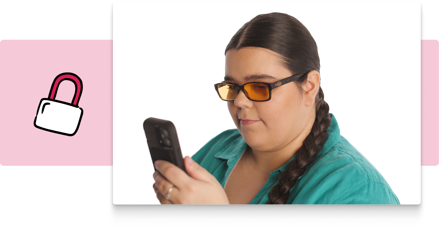 A woman with long brown hair tied into a braid wearing orange tinted glasses. In her hand she is holding and using a smartphone. Next to her is an illustrated lock icon on a pink background.
